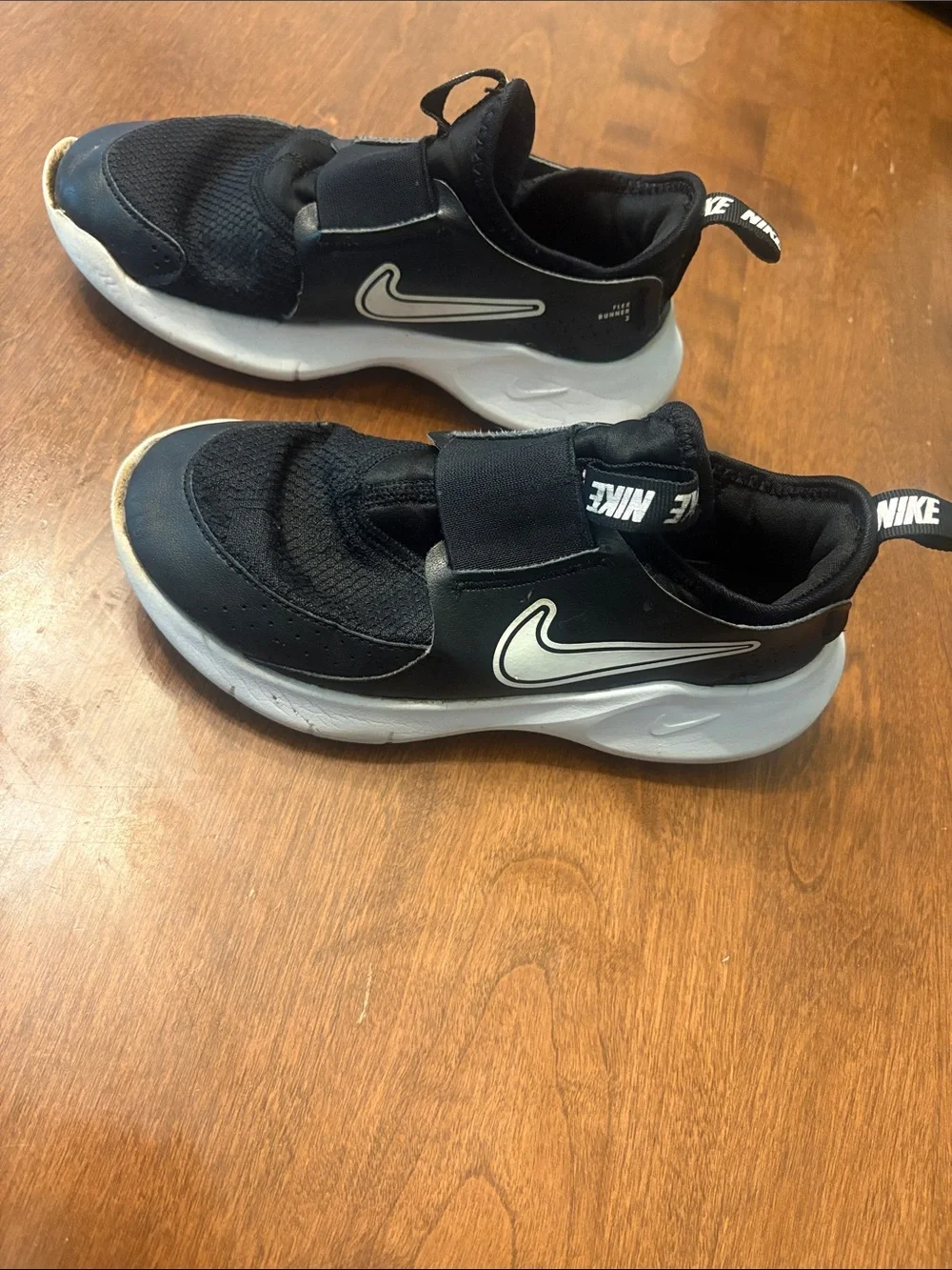 Nike Kids Black and White Slip-On Athletic Sneakers